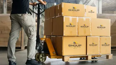 Man in shipping warehouse at Shoup Manufacturing.